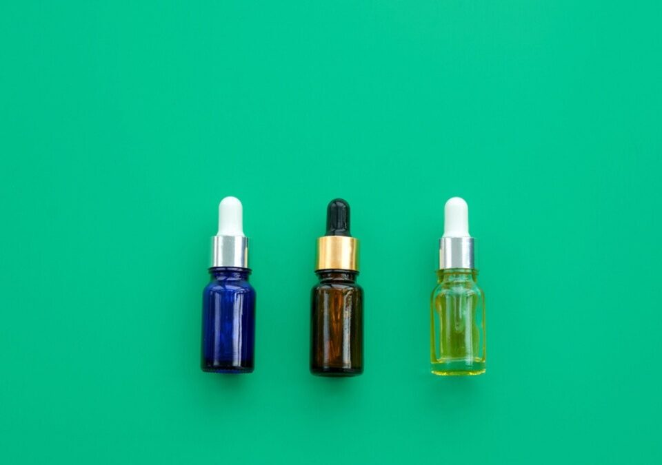 three type of tincture bottles with different colors