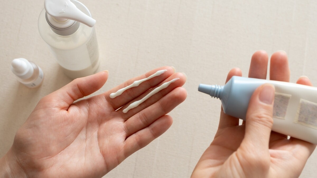 woman applying cbd topicals